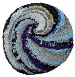 Hooked Textile Swirl Cushion.